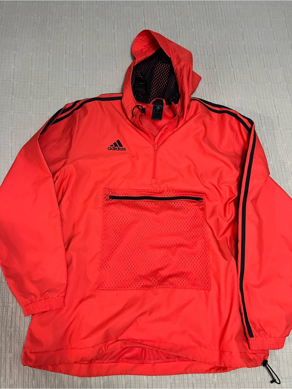 adidas Men’s Orange Hooded Pullover Rain Jacket with Black Stripe Accents